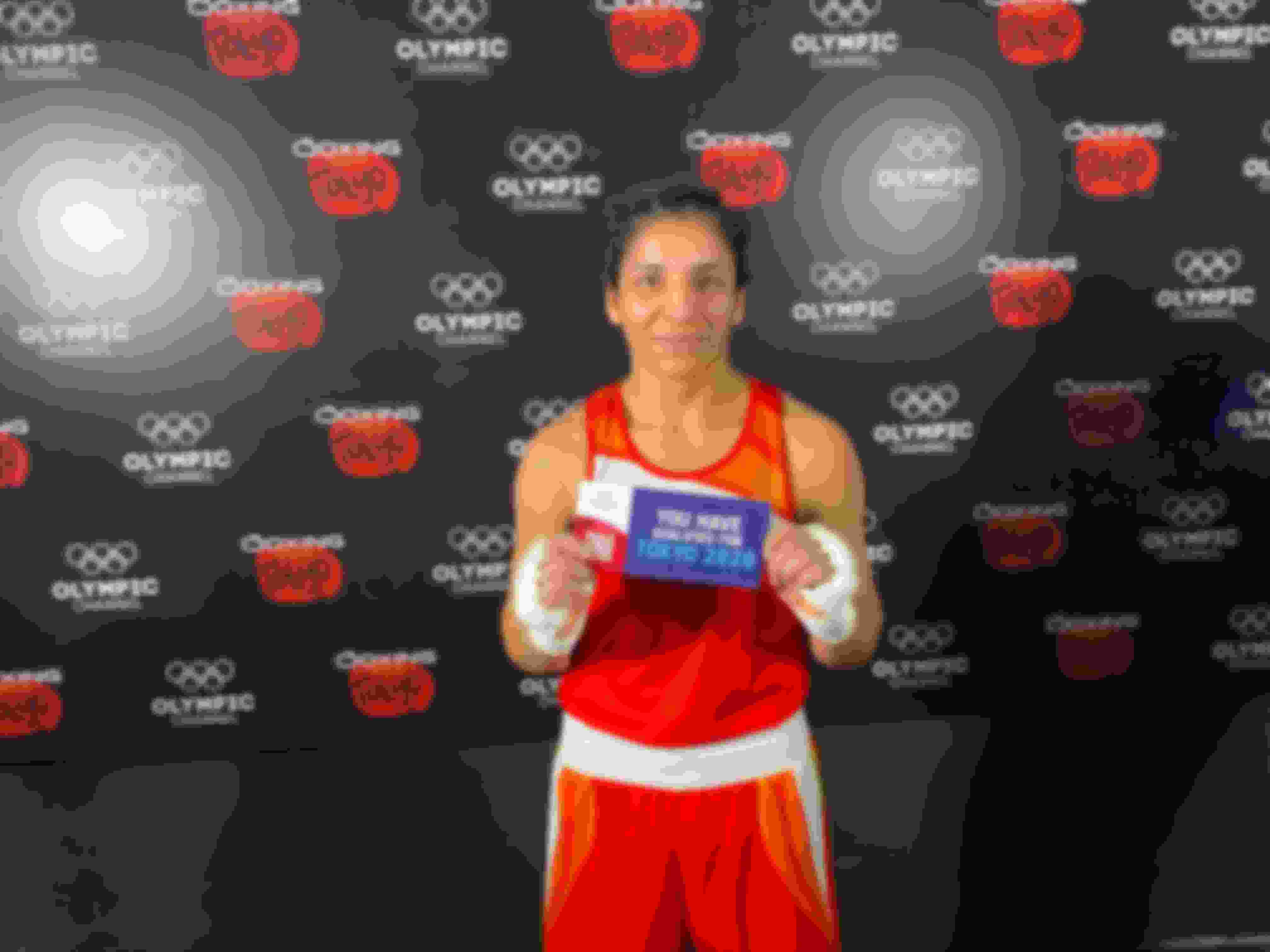 Simranjit Kaur with her ticket to Tokyo 2020 after winning her quarter-final bout at the Asian boxing Olympic qualifiers