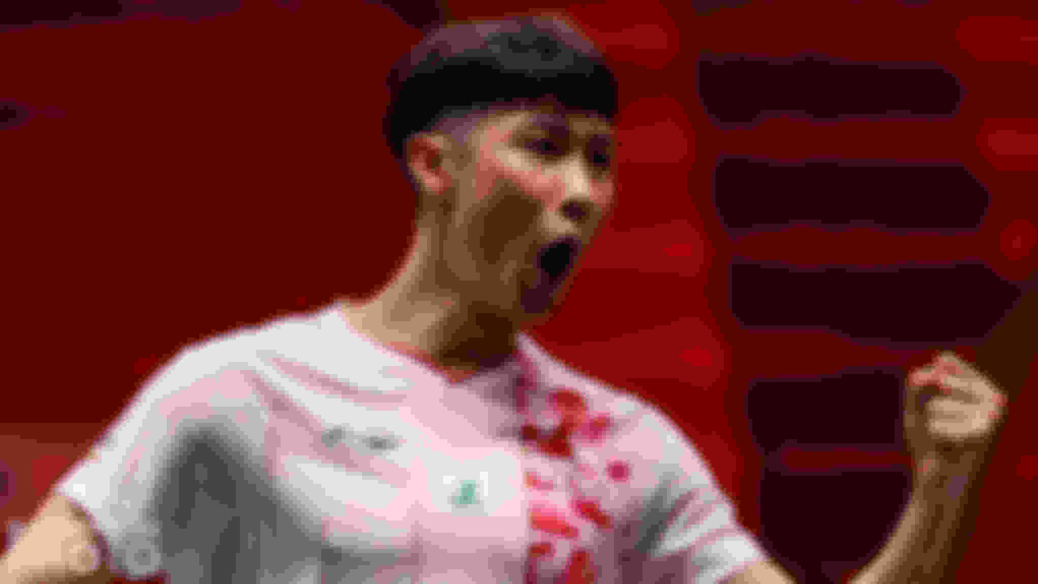 Lovin' it: Loh Kean Yew produced a strong win over the tenacious Chou Tien Chen to start his Tour Finals campaign.