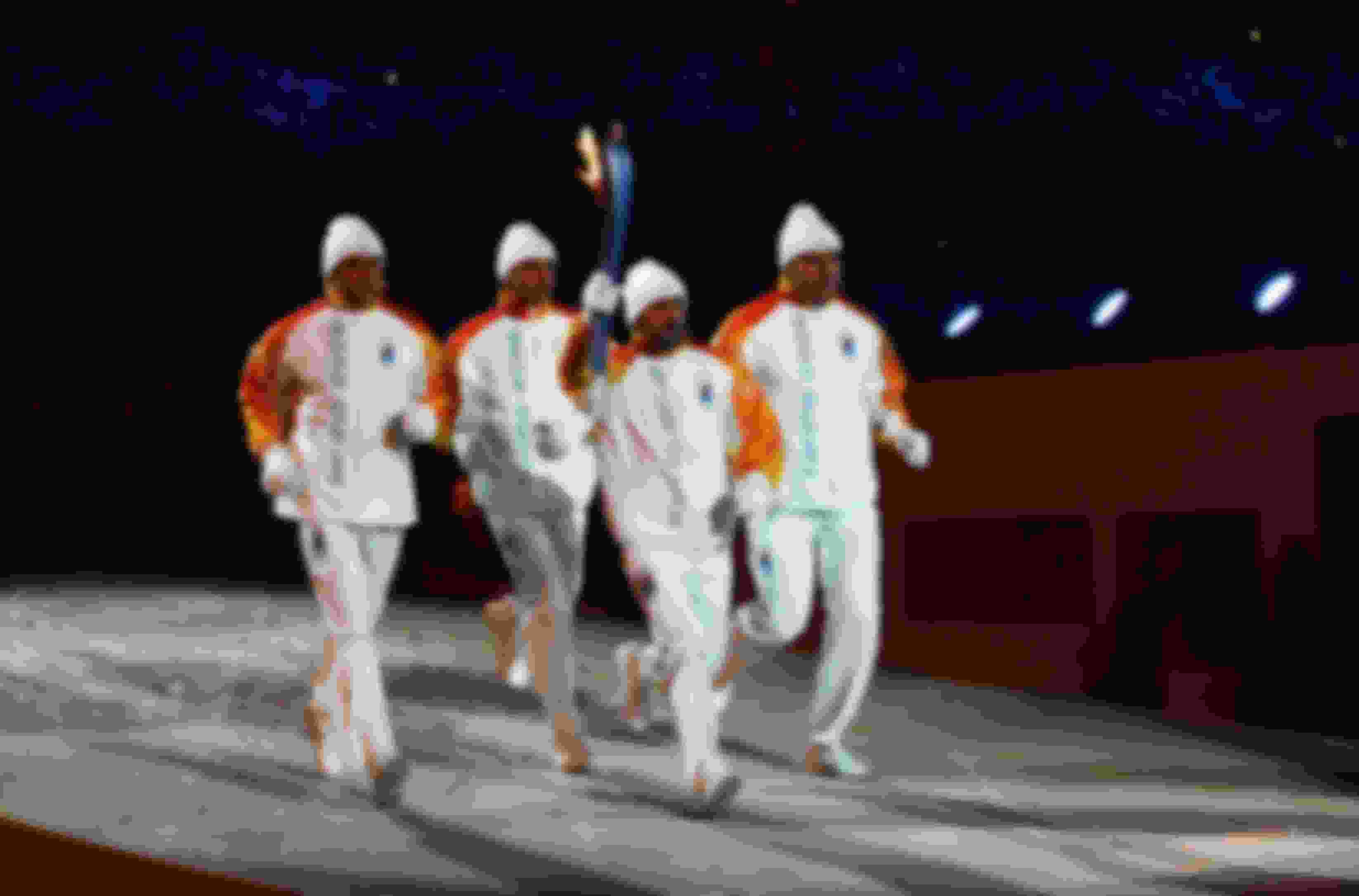 Silvio Fauner, Marco Albarello, Maurilio de Zolt e Giorgio Vanzetta: la storica staffetta della 4x10 di Lillehammer con la Torcia Olimpica alla Cerimonia di Apertura di Torino 2006. a Torino 2006