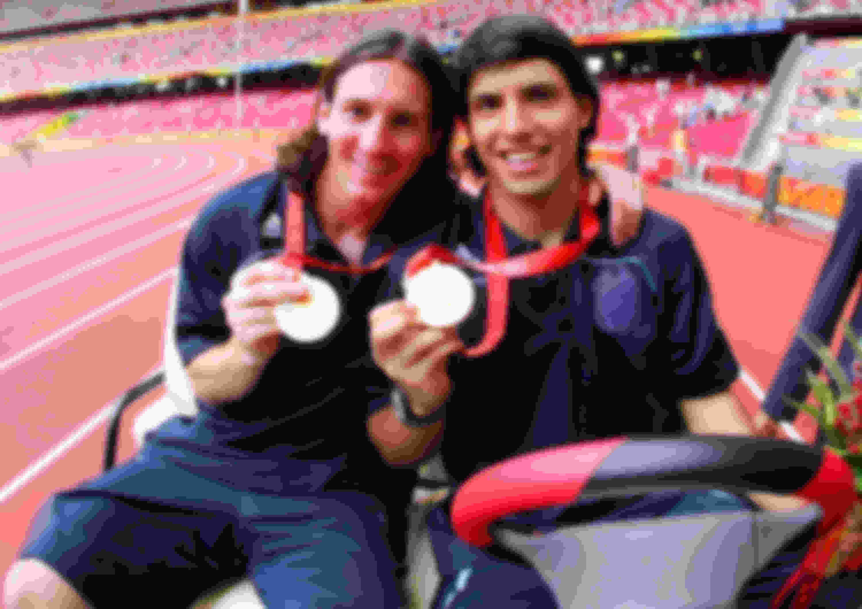 Argentina's Lionel Messi and Sergio Aguero with Beijing 2008 Olympics gold medals