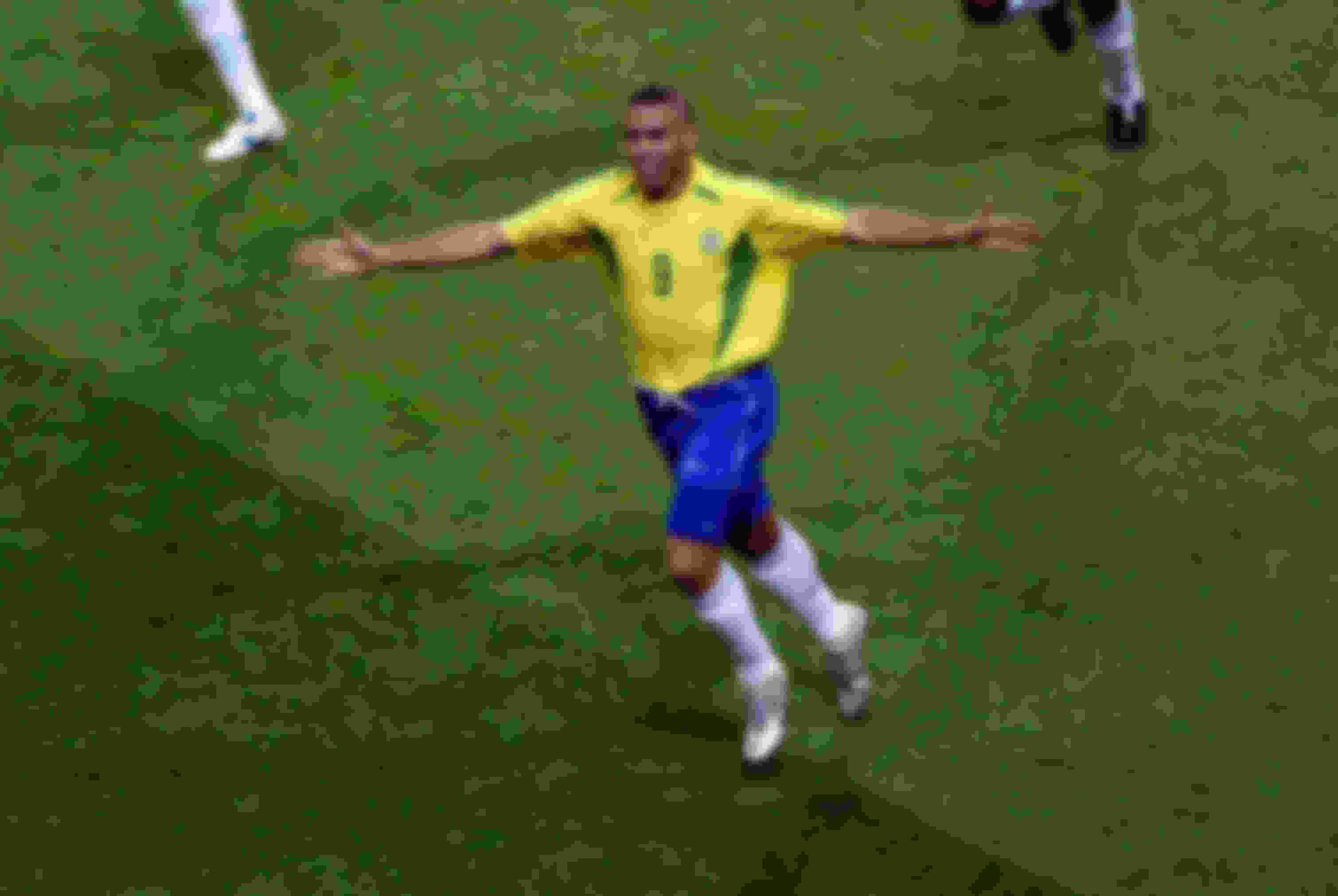 Brazil striker Ronaldo Nazario celebrates scoring a goal at the 2002 World Cup