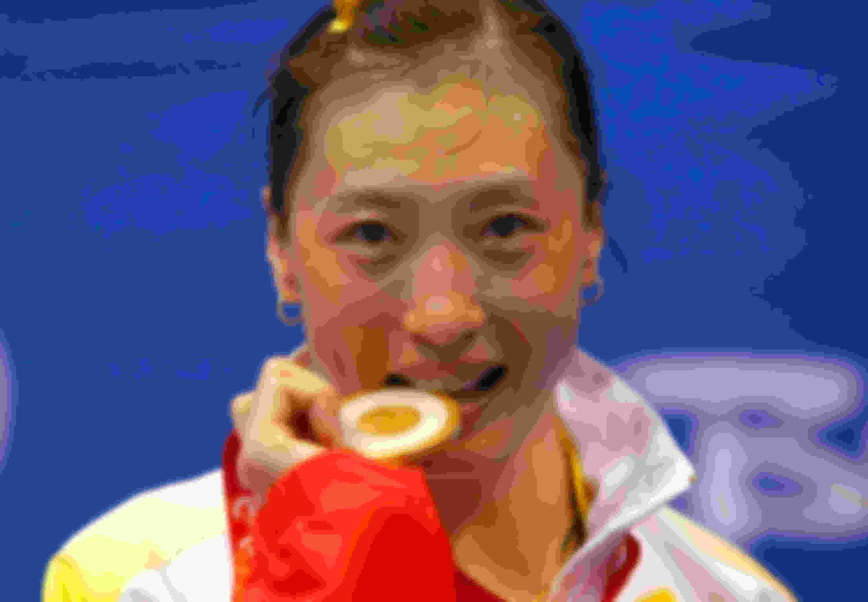 Zhang Ning is the first woman to win consecutive Olympic badminton singles gold medals.