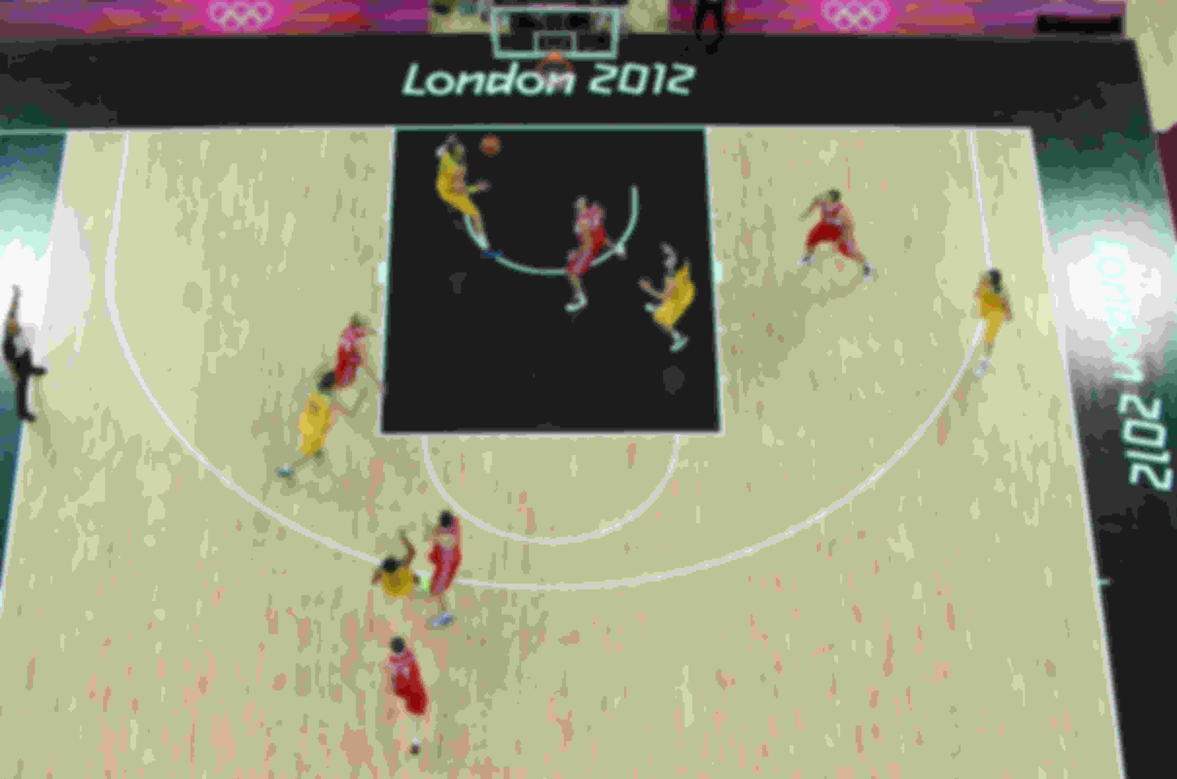 The key in the basketball court is a rectangular painted area inside the three-point arc.