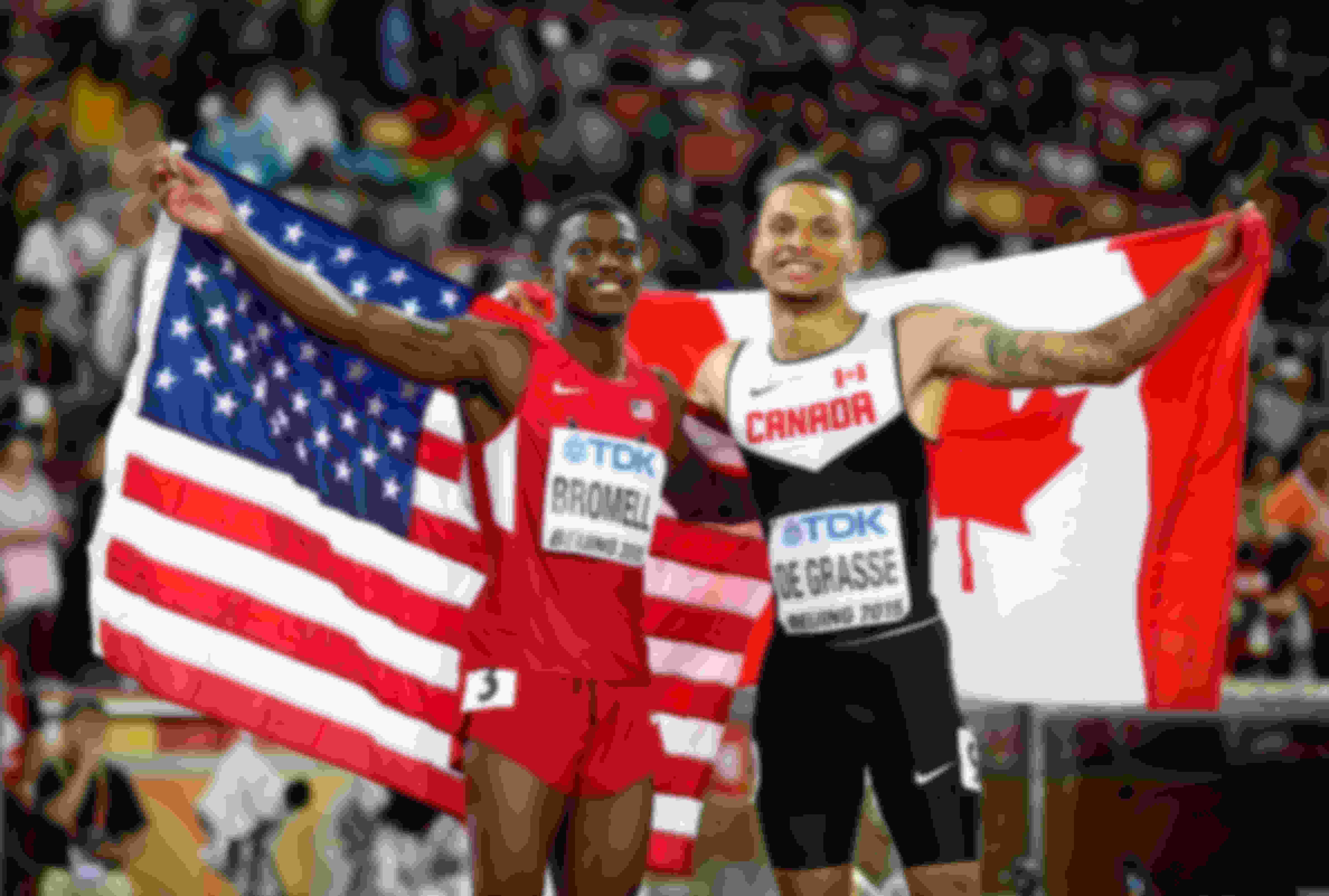 Trayvon Bromell and Andre De Grasse celebrate sharing 100m bronze at the 2015 World Athletics Championships in Beijing