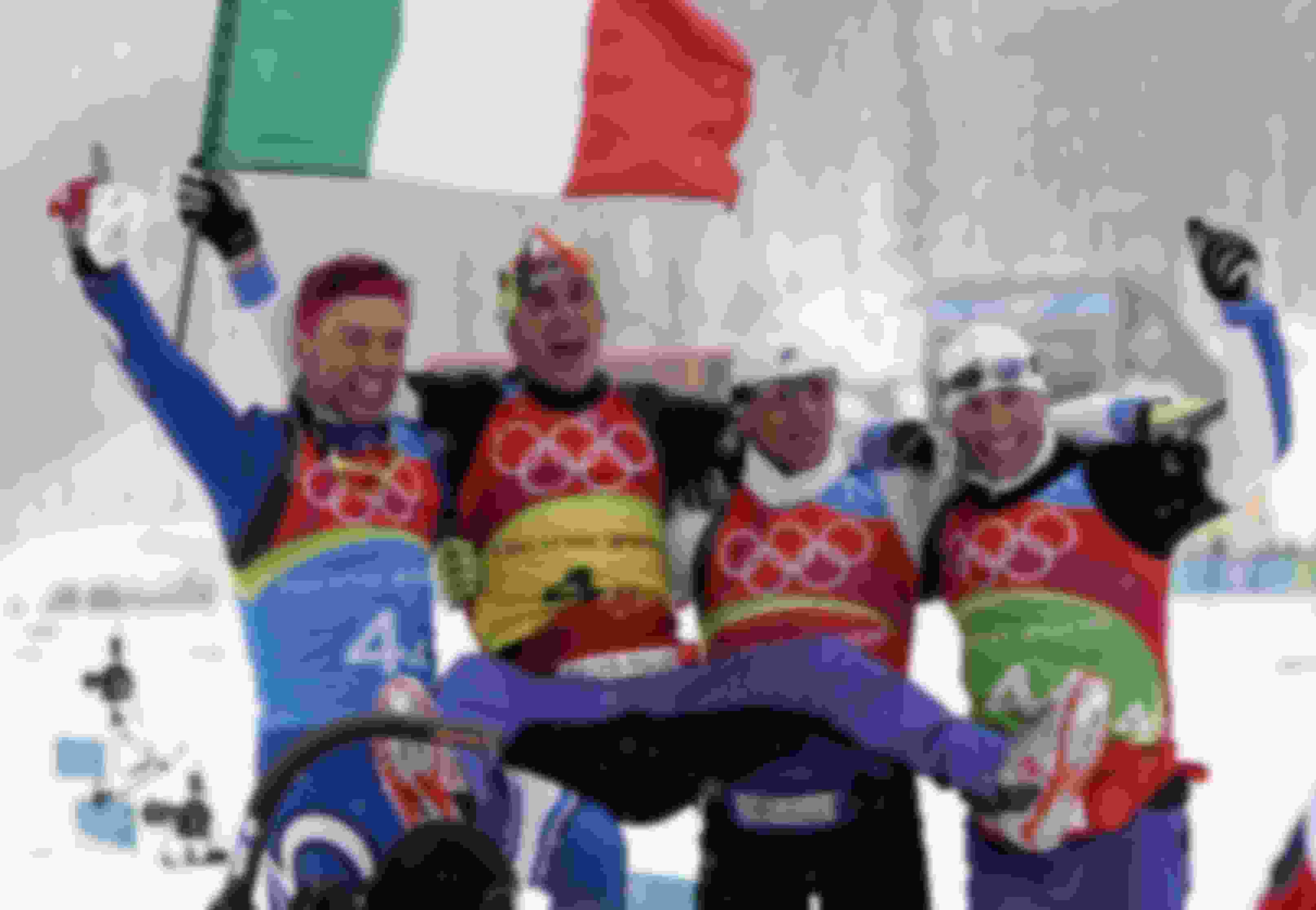 Cristian Zorzi, Pietro Piller Cottrer, Fulvio Valbusa e Giorgio Di Centa, oro nella staffetta maschile 4x10 dello sci di fondo a Torino 2006.