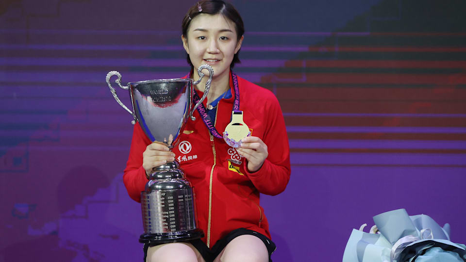 Chen Meng poses with her gold medal and the Women's World Cup trophy after beating Sun Yingsha in the 2020 final in Weihai, China. (Photo: ITTF)