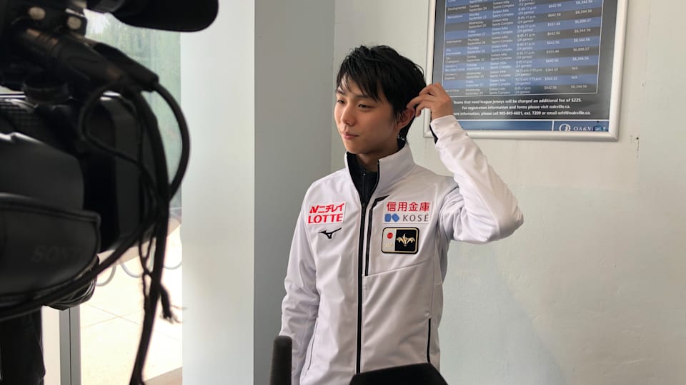 Yuzuru Hanyu faces the media after his short program at the Autumn Classic International