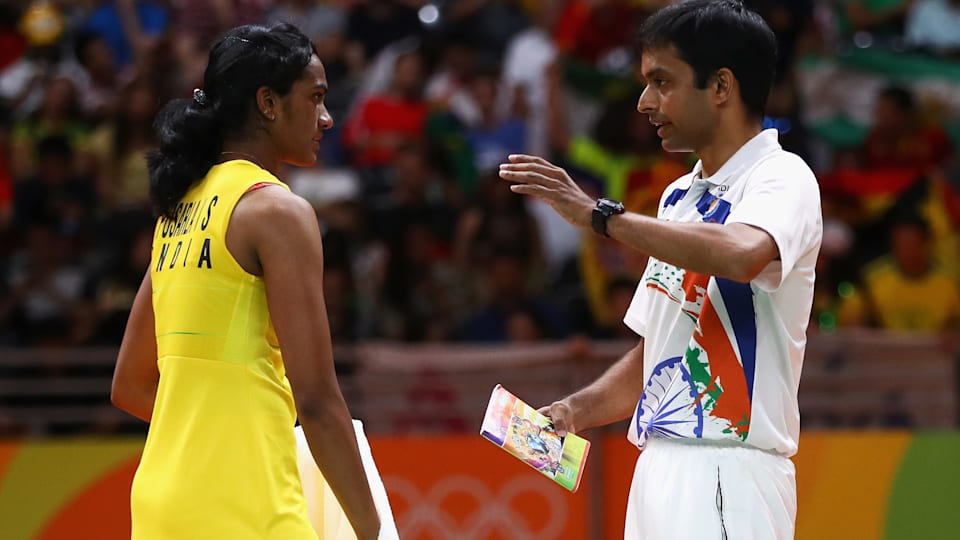 Indian badminton stars PV Sindhu and Pullela Gopichand.
