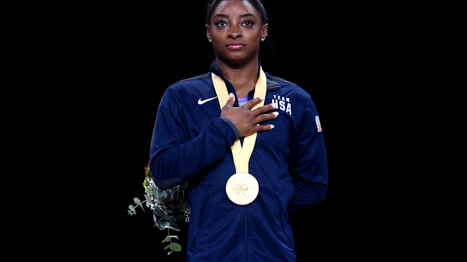 Simone Biles with her gold medal for winning the floor final at the 2019 World Artistic Gymnastics Championships