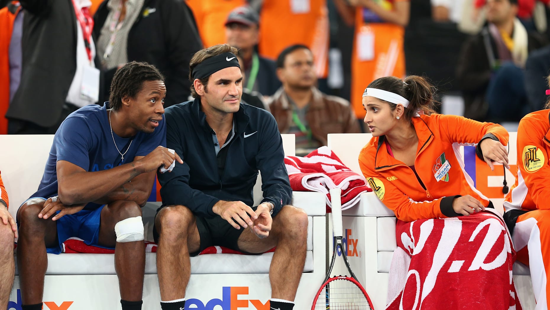 Sania Mirza with Roger Federer and Gael Monfils at IPTL 2014 (Source: Olympics.com)