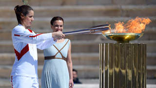 Lighting of the Olympic torch during the Flame Handover Ceremony for the Tokyo 2020 Summer Olympics on March 19, 2020 in Athens, Greece (Photo by Aris Messinis - Pool/Getty Images Europe)