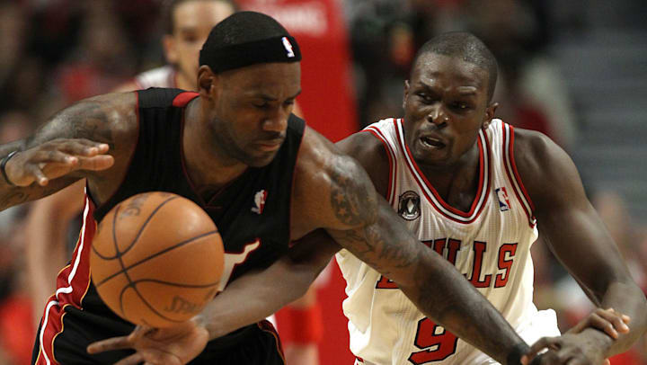 Luol Deng (right) defends LeBron James during his Chicago Bulls days.