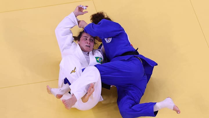 Maria Portela em luta contra Madina Taimazova (ROC)