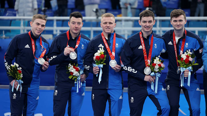 Britain's curling silver medallists (L-R) Ross Whyte, Hammy McMillan, Bobby Lammie, Grant Hardie and skip Bruce Mouat 