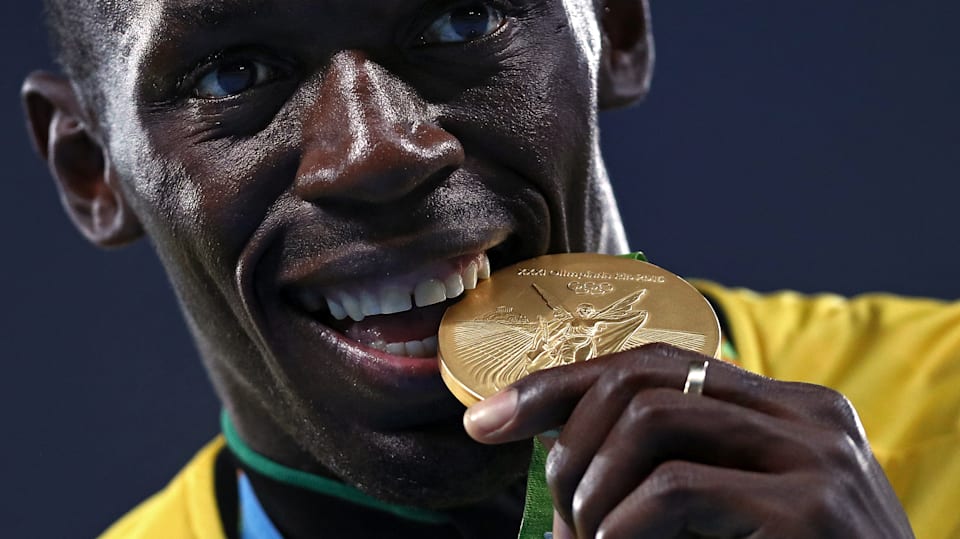 Why do Olympic athletes bite their medals?