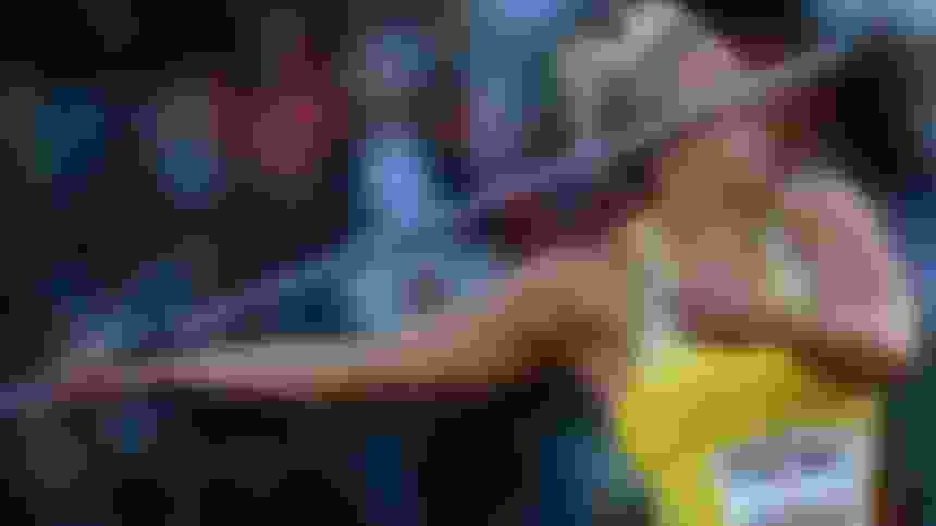 A javelin is cylindrical with tapered ends and a grip at its centre of gravity.