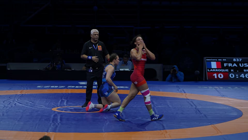 Koumba Larroque celebrates her bronze medal at the 2023 Wrestling World Championships