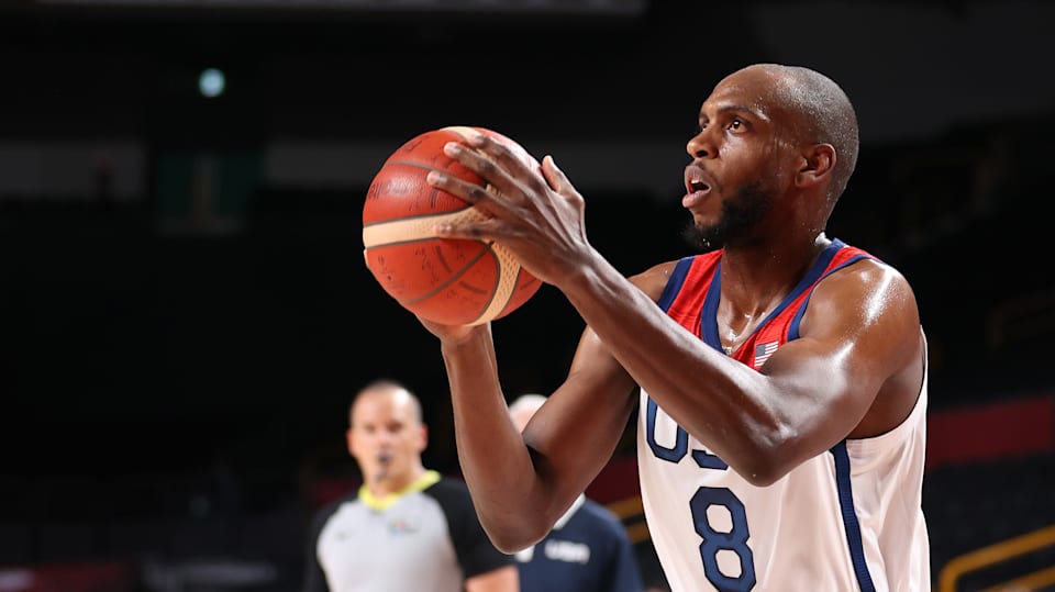 Khris Middleton playing basketball in the arena