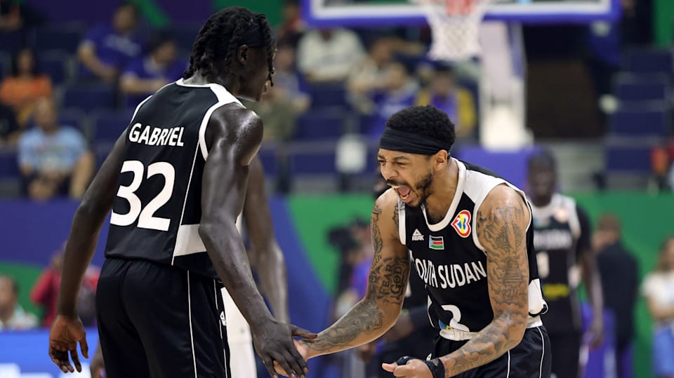 Carlik Jones (R) celebrates during South Sudan's win over Angola which clinched a Paris 2024 Olympic berth