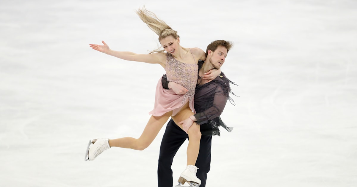 Sinitsina and Katsalapov win first ice skating title at world skating competitions
